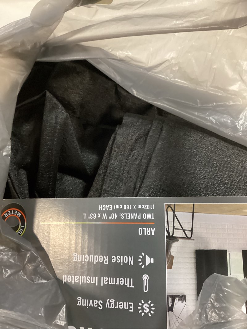 Condition photo showing Good Condition for sun zero 2-pack arlo textured thermal insulated grommet curtain panel pair  40 x 63   black