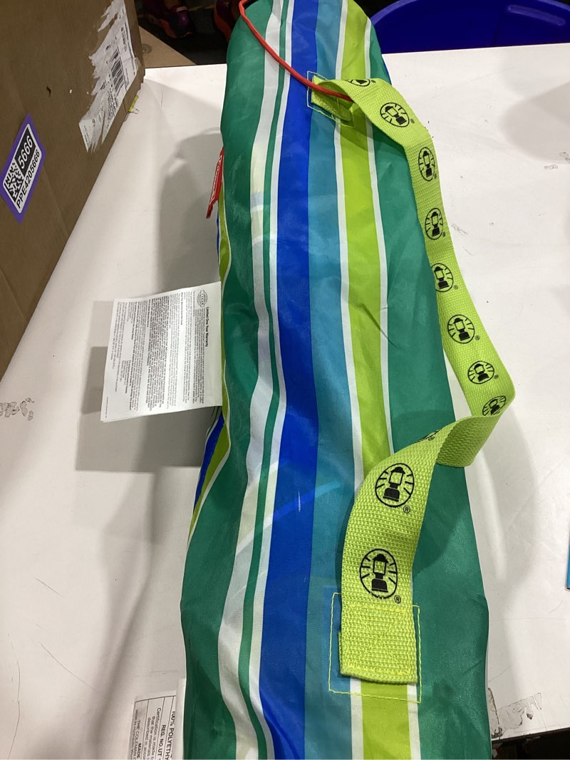 Condition photo showing As Is for coleman utopia breeze beach chair, lightweight & folding beach chair with cup holder, seatback pocket, & relaxed design; 21-inch seat supports up to 250lbs