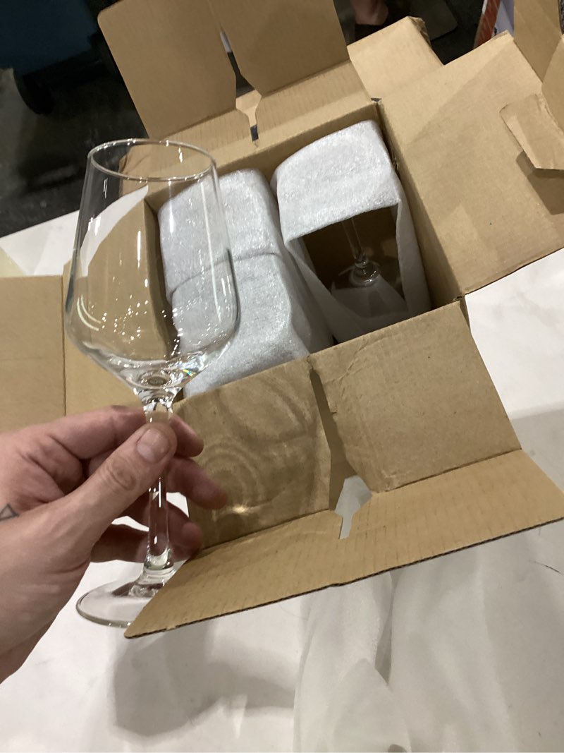 Condition photo showing New/Like New for 4 pack white wine glasses