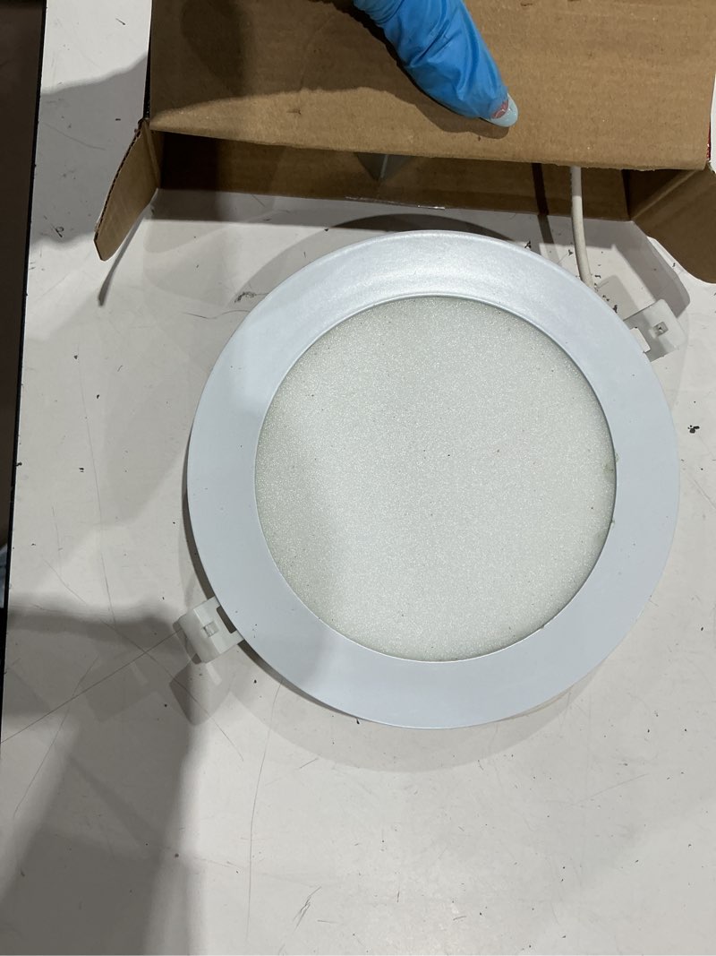 Condition photo showing As Is for juno contractor select wf6 matte white 6-in 950 -lumens switchable white round dimmable led canless wet rated recessed downlight