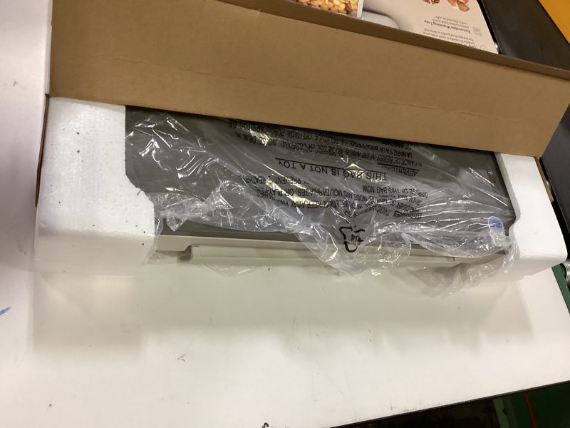 Condition photo showing As Is for bella 10" x 20" Electric Griddle with Warming Tray, EverGood™ Ceramic Nonstick Coating & Removable Temperature Probe, Dishwasher-Safe Drip Tray & Cool Touch Handles, 1500 Watt, Oatmilk 10" x 20" Oatmilk + Tray