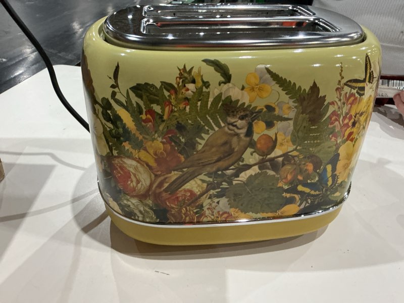 Condition photo showing As Is for hazel quinn x eduardo recife collaboration 2-slice retro toaster, 6 browning levels, 3 functions-defrost/reheat/cancel, removable crumb tray for easy to clean, 1.5 inches extra wide slots floral printed design