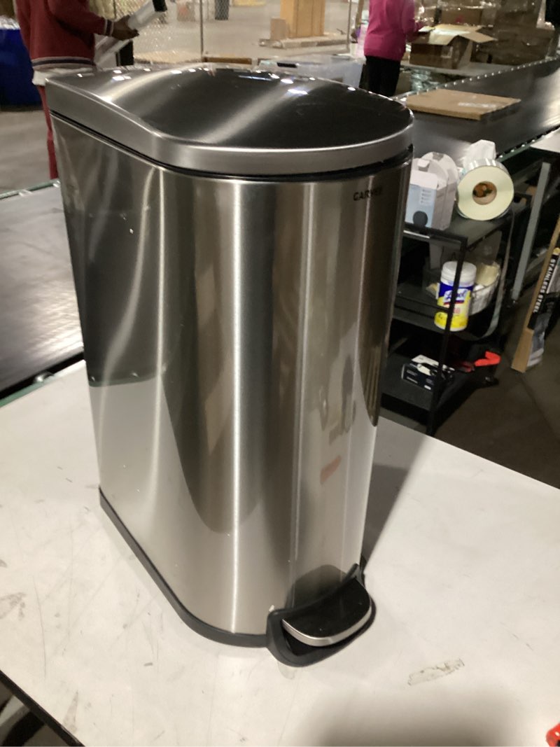 Condition photo showing As Is for Similar to Garvee 13 gal / 50 L Stainless Steel Kitchen Trash Can with Lid, Slim Rustproof Garbage Can, Large Step-on Metal Trash Bin with Inner Bucket, Rear Handle, Soft Close Lid, Silver Silver 13.2 Gallons