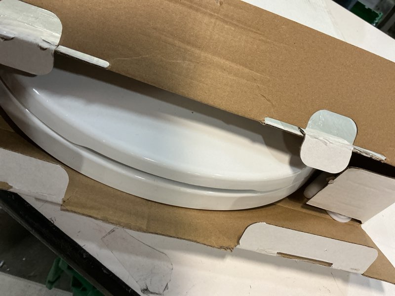 Condition photo showing As Is for round toilet seat, standard 16.5” slow/soft close round toilet seat for round toilets, no-slam quiet-close lid, easy-to-install, white, durable never-loosen design