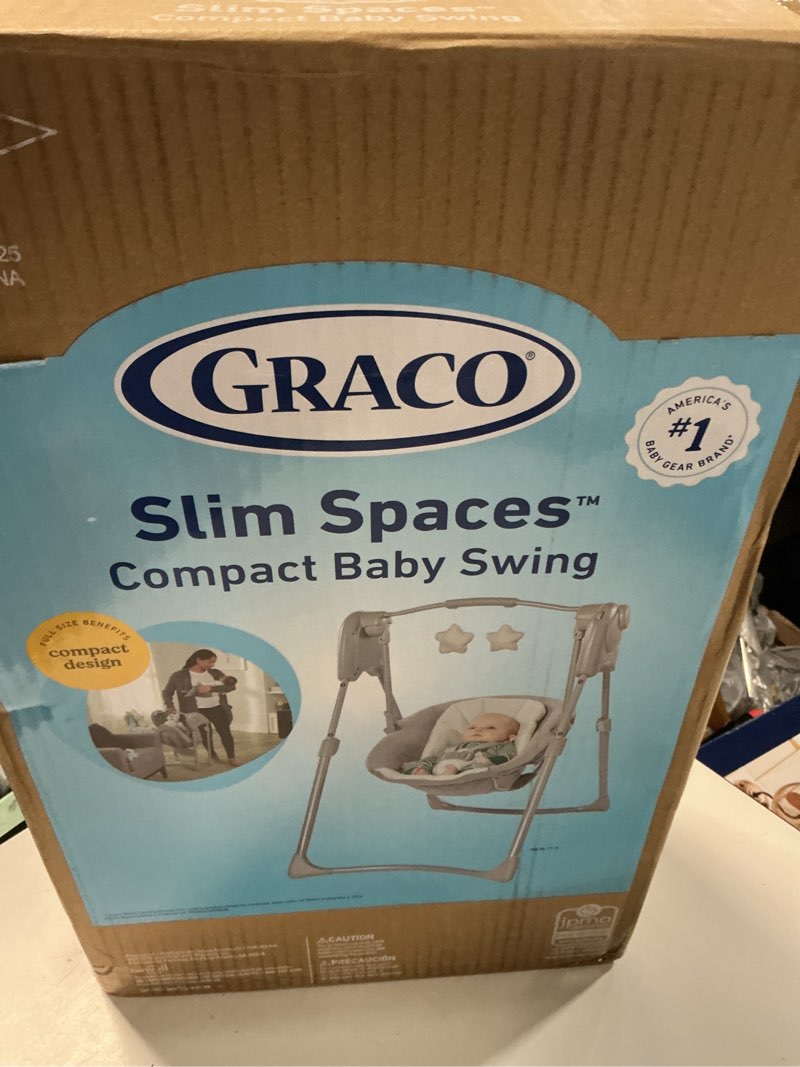 Condition photo showing New/Like New for graco slim spaces compact baby swing, space saving portable bay swing with height adjustable legs & soft toys, reign