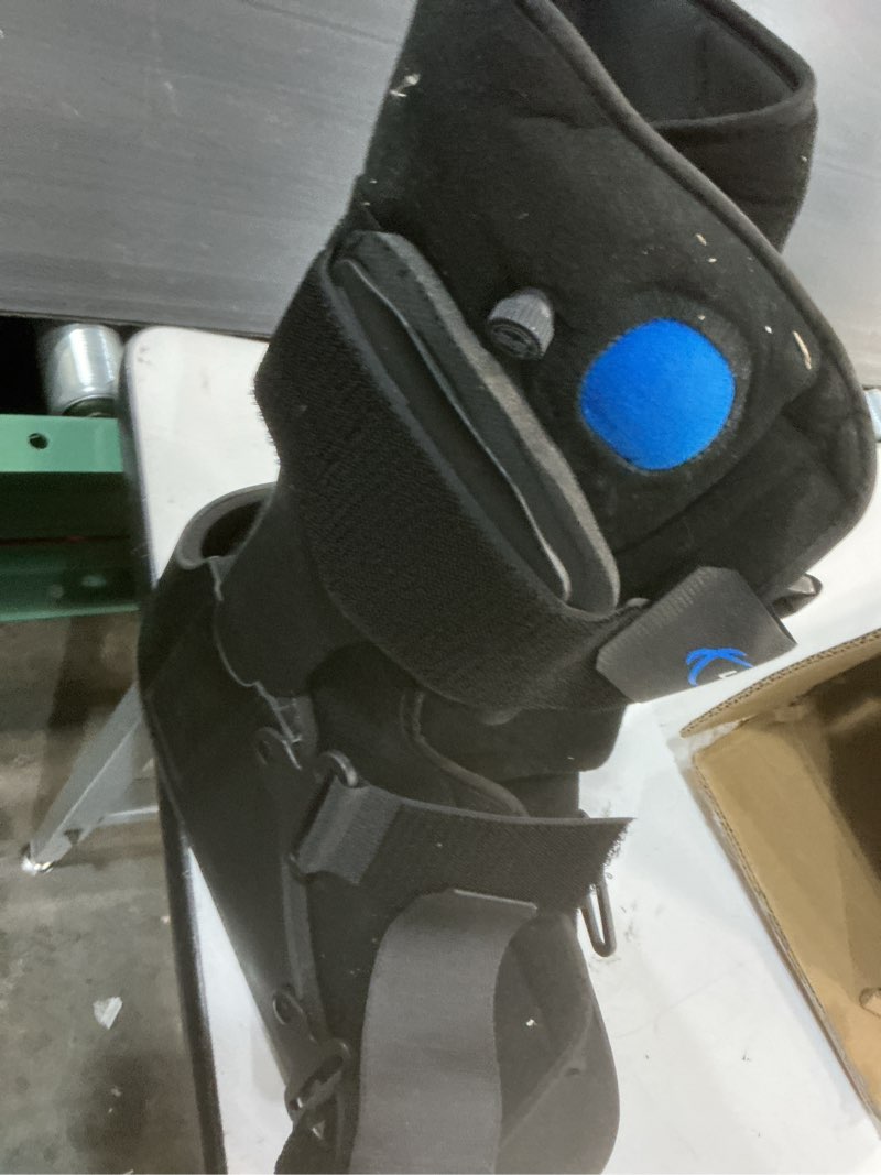 Condition photo showing As Is for united ortho short air cam walker fracture boot, large, black black large boot