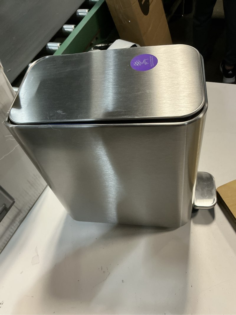 Condition photo showing As Is for simplehuman Small Bathroom Trash Can with Lid, Stainless Steel Waste Basket, 5 Liter / 1.3 Gallon, Brushed Brushed Stainless Steel
