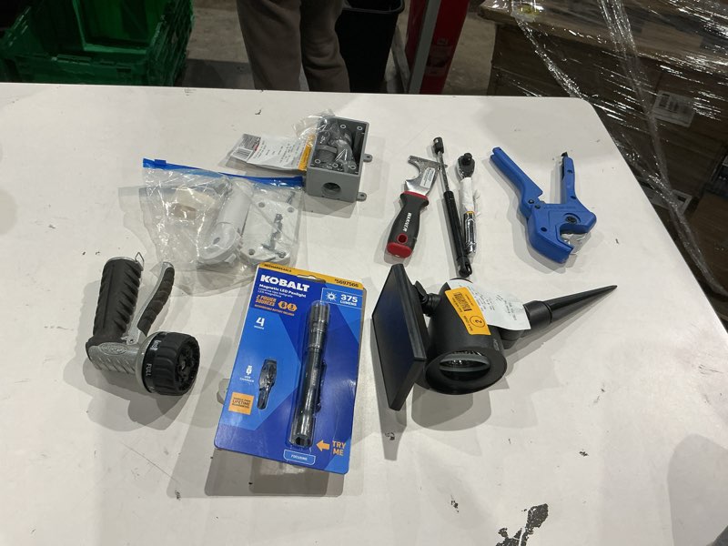 Condition photo showing As Is for assorted home improvement lot (small tools, screw, home accessories, etc.)