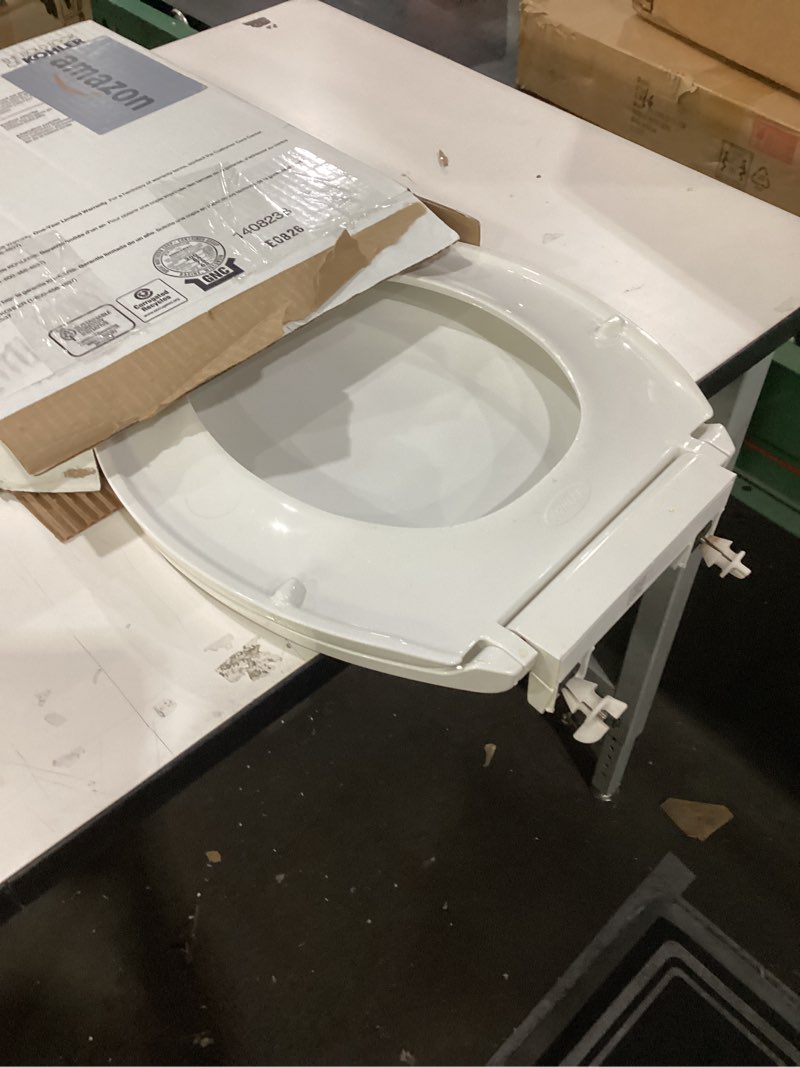 Condition photo showing As Is for KOHLER 4639-RL-0 Cachet ReadyLatch Round Toilet Seat Soft Close, White White Round Ready Latch