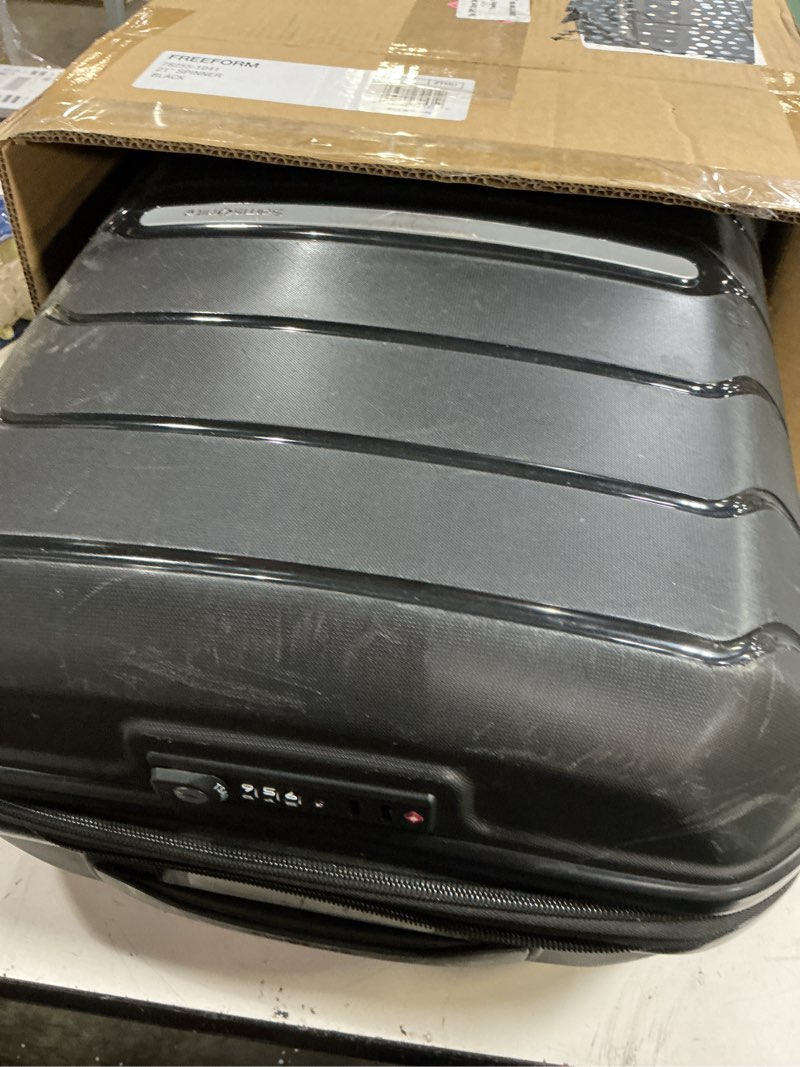 Condition photo showing As Is for samsonite freeform hardside carry-on luggage with spinner wheels - hardshell suitcase - tsa, airline-approved - expandable hard shell, smooth rolling wheels for lightweight travel – black carry-on spinner black
