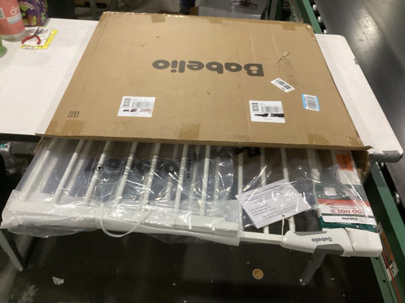 Condition photo showing New/Like New for BABELIO 36-57" Extra Wide Baby/Dog Gate, Auto Close with Large Walk Thru Door,Safety for Pet, House, Stairs and Doorways, Pressure Mounted for Chlid, White White 30"Tall 36"-57" Wide