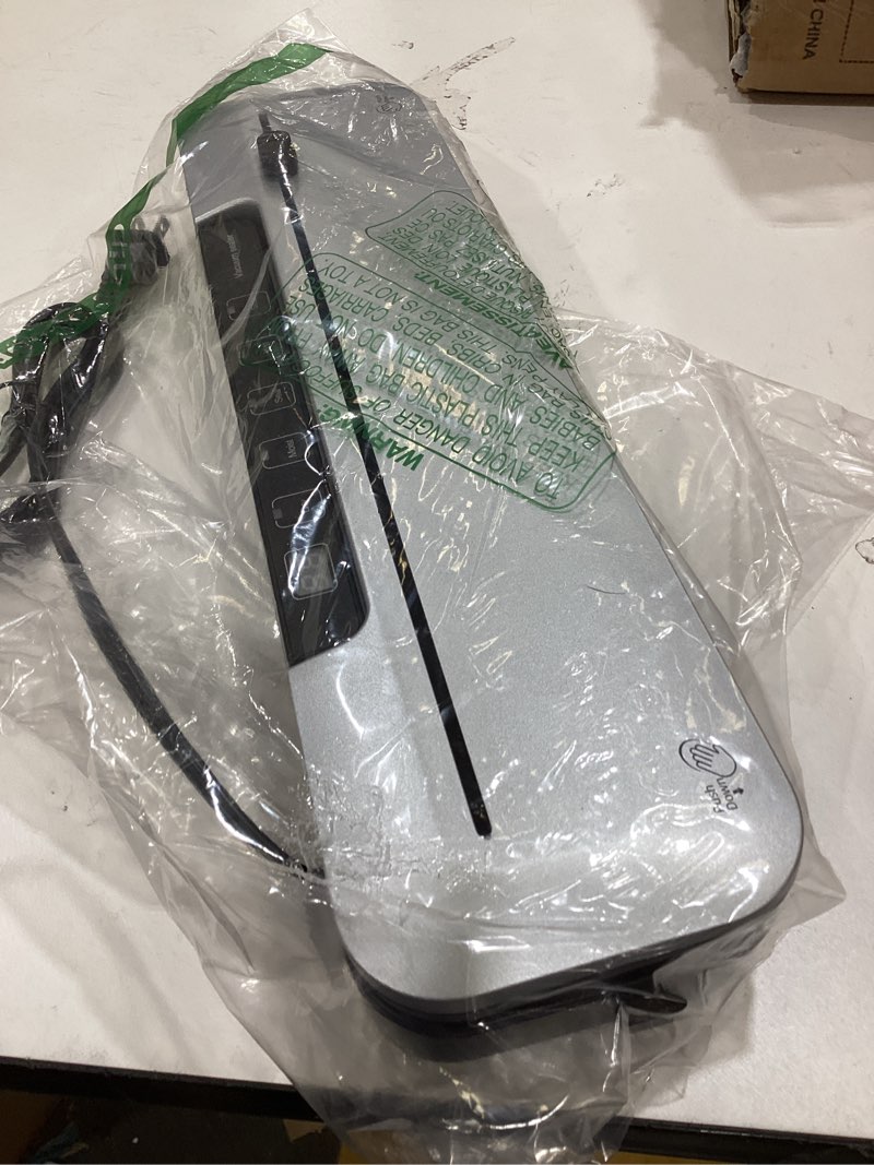 Condition photo showing As Is for vacuum sealer machine 75kpa food with 6-in-1 dry/moist modes & digital timer, compact lightweight design, built-in cutter + 10 bags (black silver)