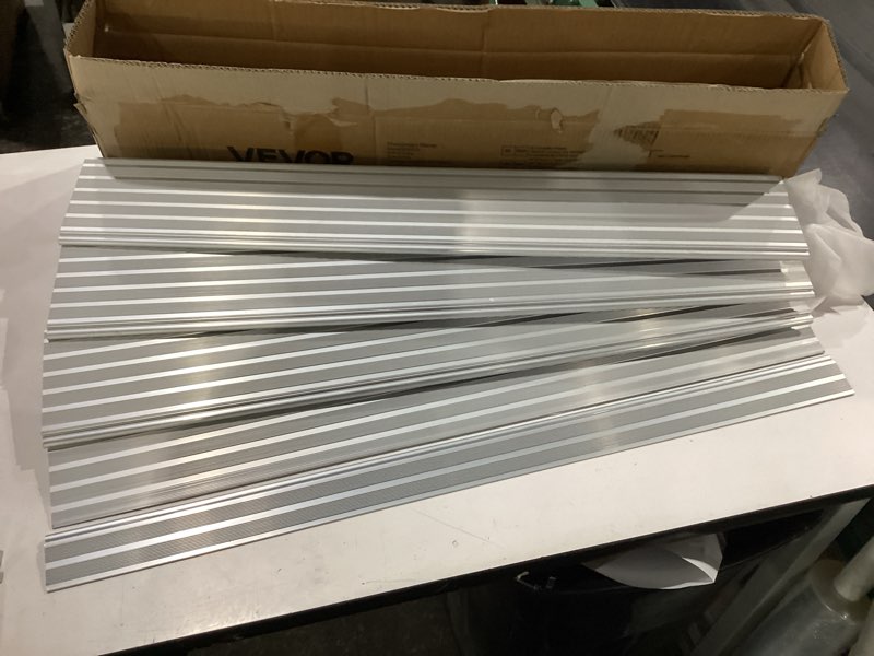 Condition photo showing New/Like New for vevor door threshold ramp 4‘’ rise aluminum alloy threshold ramp rated 800 lbs load capacity, handicap ramps for home steps for wheelchair, scooters, power chairs, walkers, bicycle, tricycle 4" rise gray