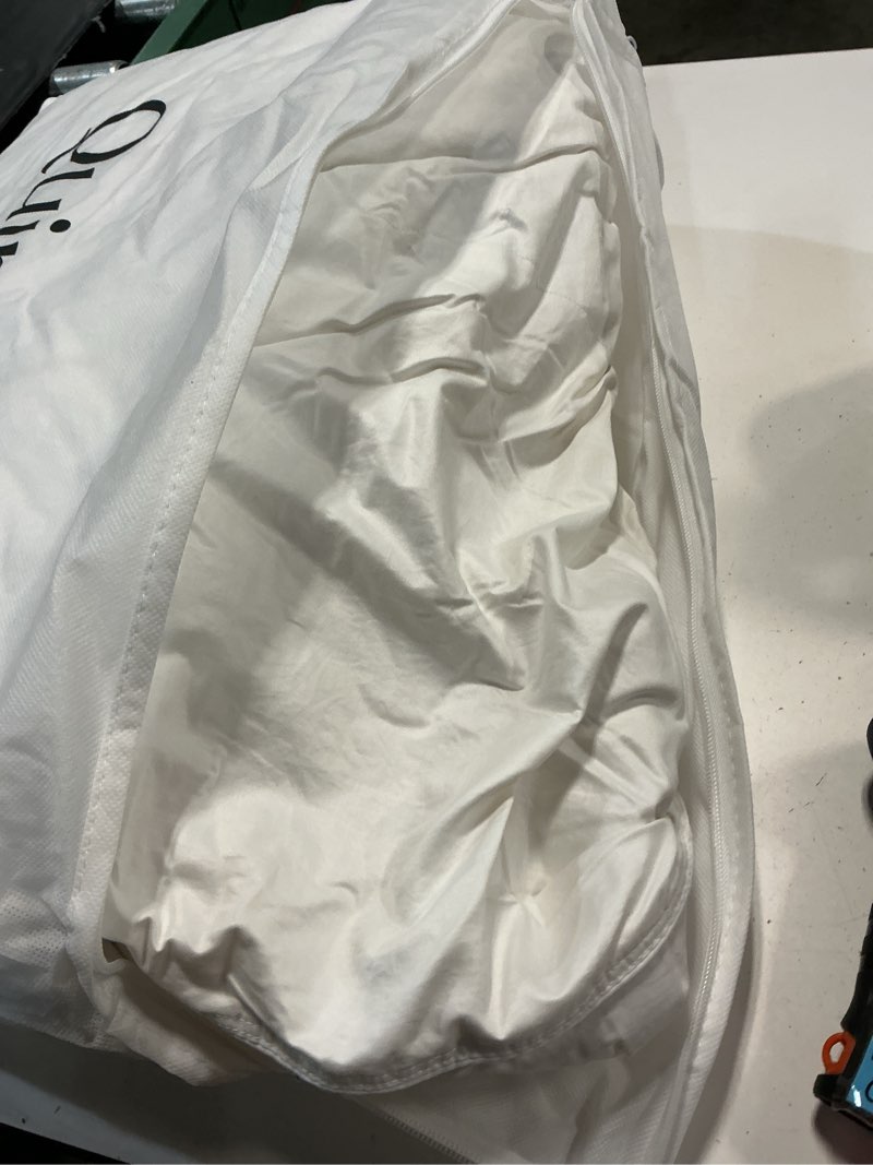 Condition photo showing As Is for premium down comforter, king/cal king, down