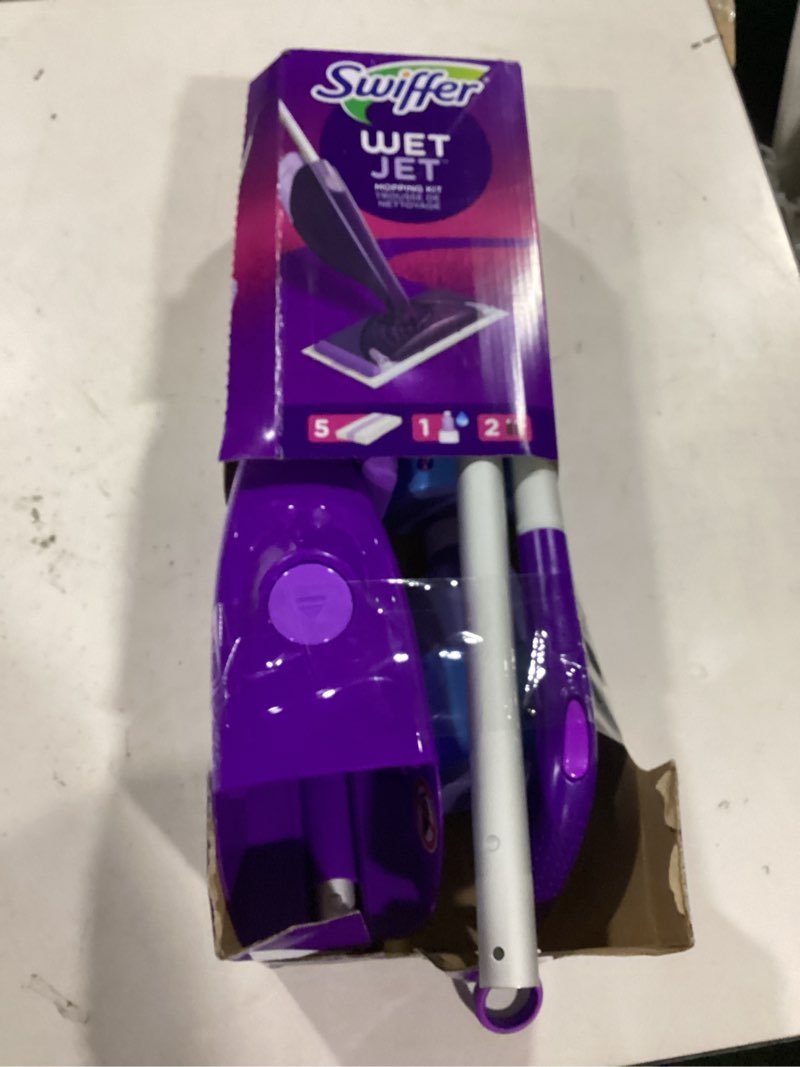 Condition photo showing New/Like New for swiffer wetjet 11 in. w wet mop kit
