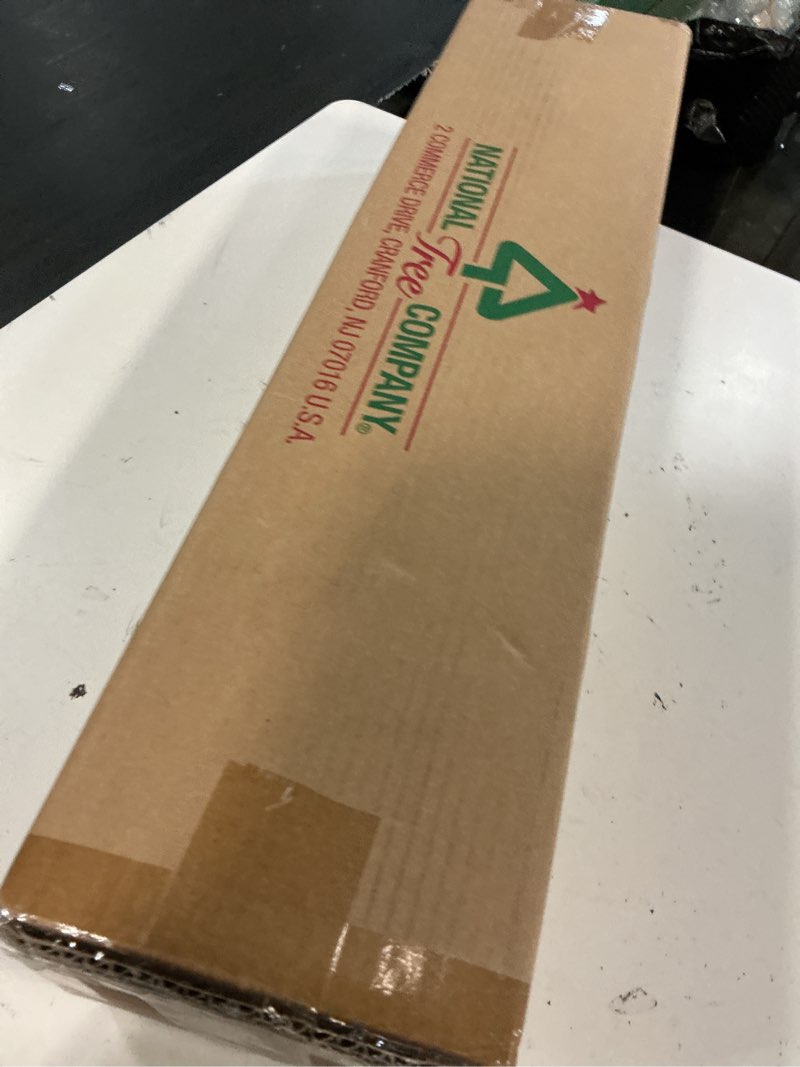 Condition photo showing New/Like New for national tree company 9 ft pre-lit crestwood spruce artificial christmas garland, christmas decoration with glitter, pinecones, red berries, 50 clear lights, 180 tips, green plug in tree