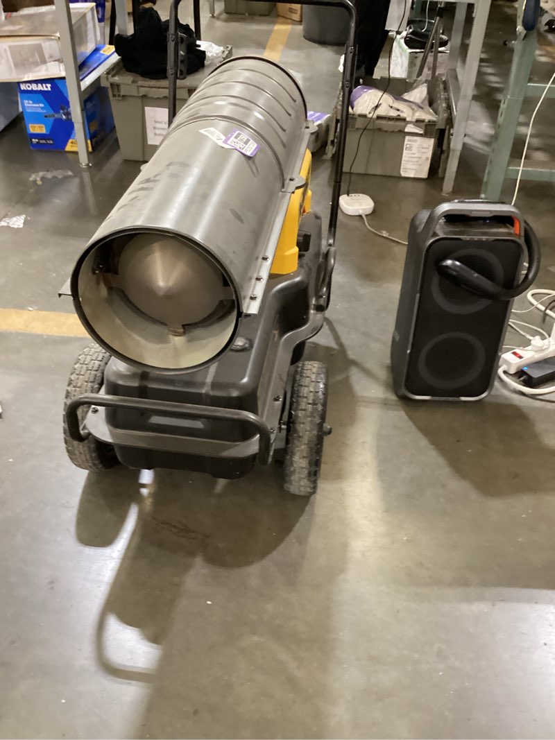 Condition photo showing As Is for overview     +2             this is a dewalt forced-air portable heater, which likely runs on kerosene or diesel fuel to heat