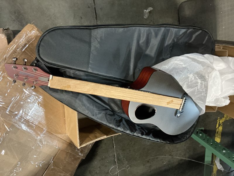 Condition photo showing New/Like New for Donner 38" Carbon X Wood Acoustic Guitar Beginner & Intermediate Learner Kits - Carbon Fiber Top, Wooden Body, Durable Solid Guitar with Case, Strap, Steel-String, RISING-G1 (Satin, Brown) Brown Satin