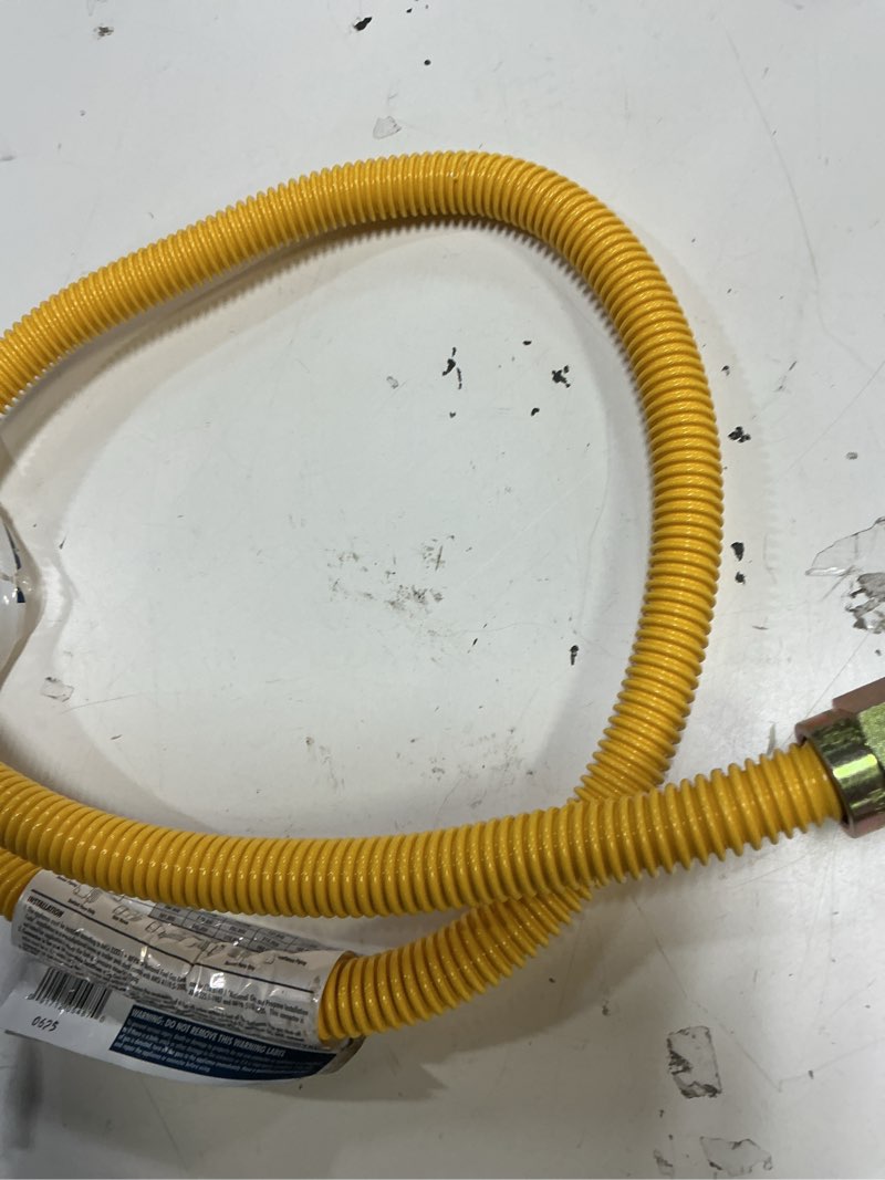 Condition photo showing As Is for eastman 1/2 in. fip x 1/2 in. d mip 48 in. stainless steel installation kit