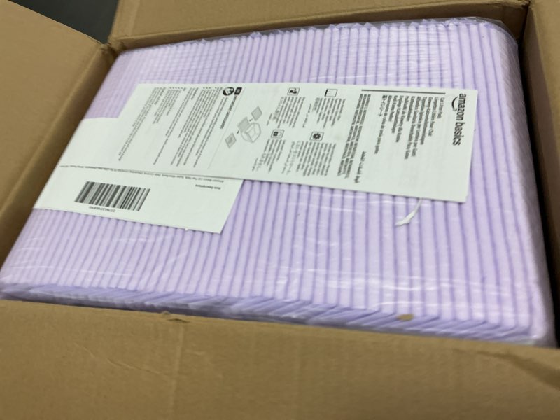 Condition photo showing New/Like New for amazon basics cat pee pads, super absorbent, odor control, unscented, universal fit for litter box, disposable, white/purple, 100 count unscented 100 count