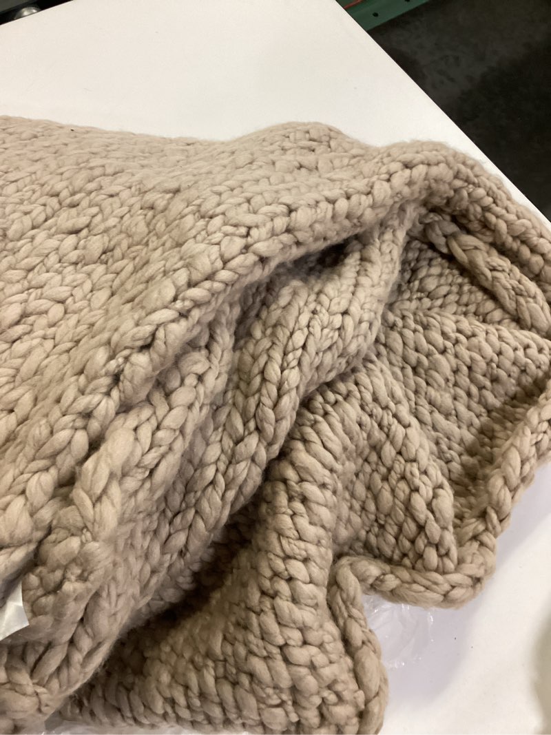 Condition photo showing New/Like New for chunky hand knit wool throw size 50 inx60 in
