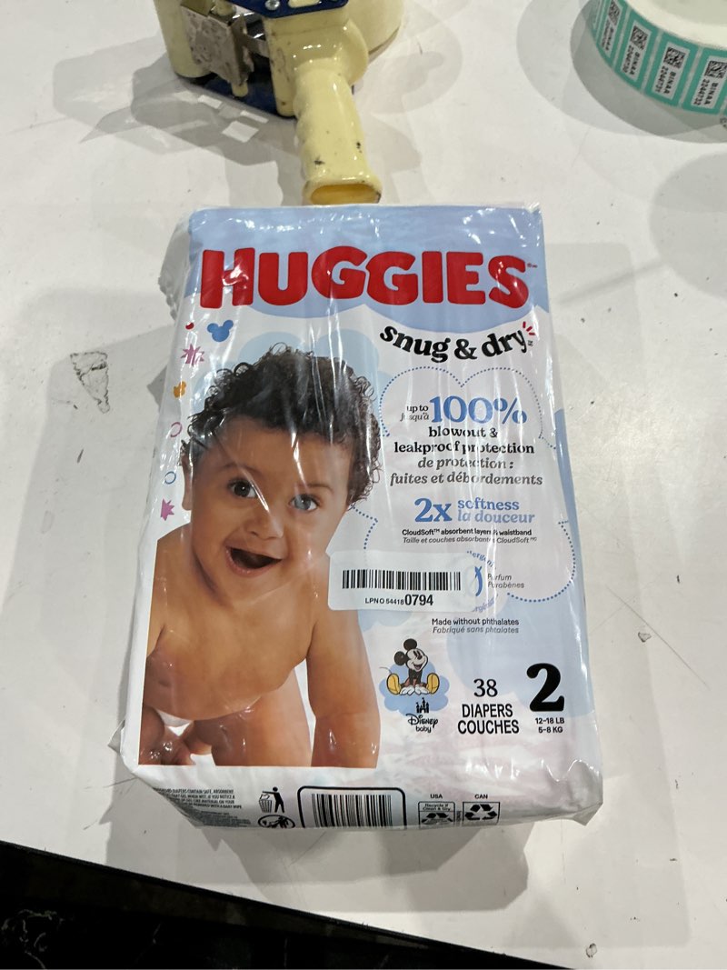 Condition photo showing New/Like New for huggies size 2 diapers, snug & dry baby diapers, size 2 (12-18 lbs), 38 count, packaging may vary size 2 38