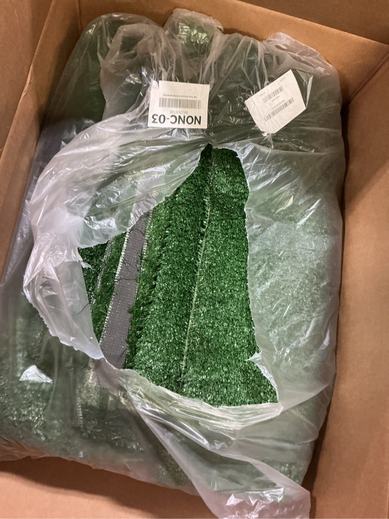 Condition photo showing As Is for Garland Rug Artificial Grass 9 Ft. X 12 Ft. Large Indoor/Outdoor Area Rug Green -Lush Green, Durable, and Low-Maintenance for Patios, Lawns, and More Green 9' x 12' (Rectangular)
