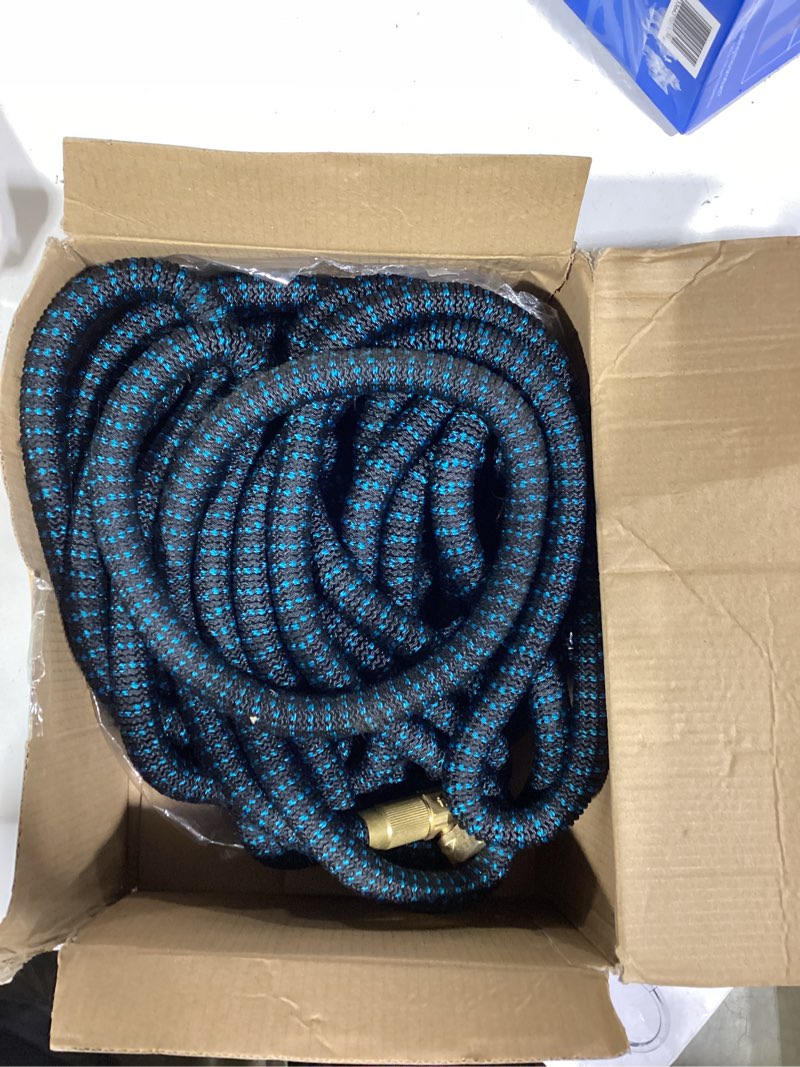 Condition photo showing As Is for flexi hose expandable garden hose with 8 function nozzle, 150ft - lightweight retractable garden hose, water hose - no-kink flexibility, 3/4 inch solid brass fittings and double latex core