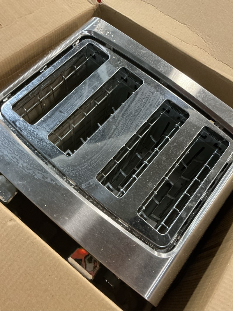 Condition photo showing As Is for black+decker 4-slice toaster, stainless steel, tr4900ssd