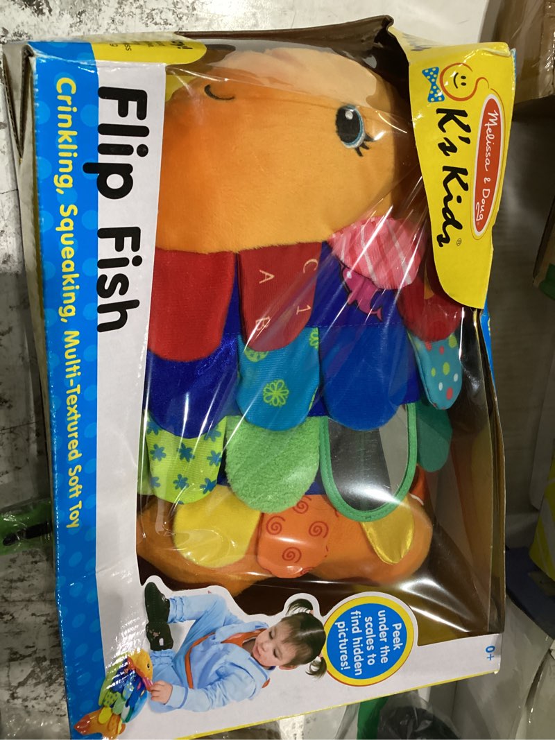 Condition photo showing New/Like New for melissa & doug flip fish soft baby toy