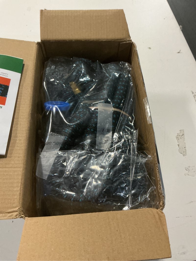 Condition photo showing Good Condition for Flexi Hose Expandable Garden Hose with 8 Function Nozzle, 50FT - Lightweight Retractable Garden Hose, Water Hose - No-Kink Flexibility, 3/4 Inch Solid Brass Fittings and Double Latex Core