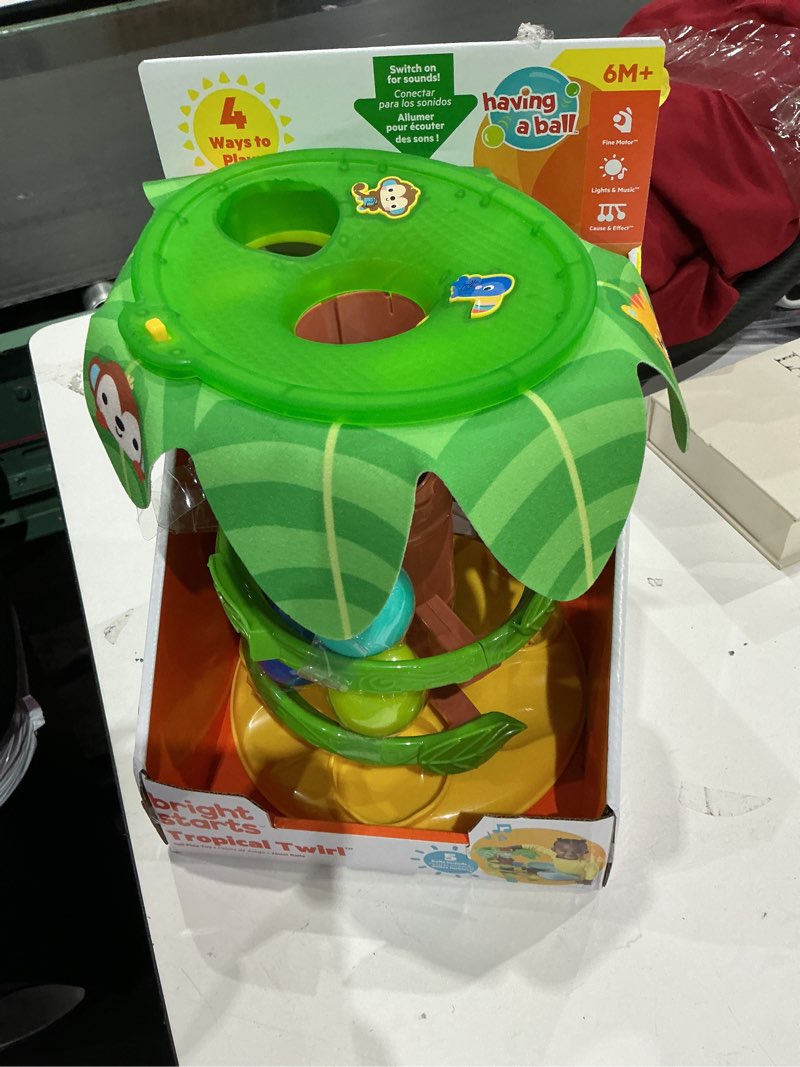 Condition photo showing Good Condition for incomplete bright starts tropical twirl ball play toy