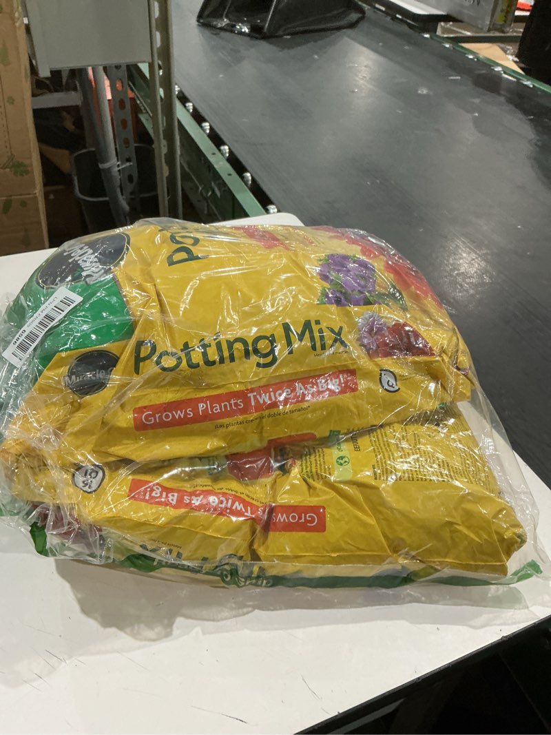 Condition photo showing Good Condition for miracle-gro potting mix - for container plants, flowers, vegetables, shrubs, annuals, perennials, potting soil mix, feeds up to 6 months, 16 qt. (2-pack) 0.53 cu. ft. 16 qt