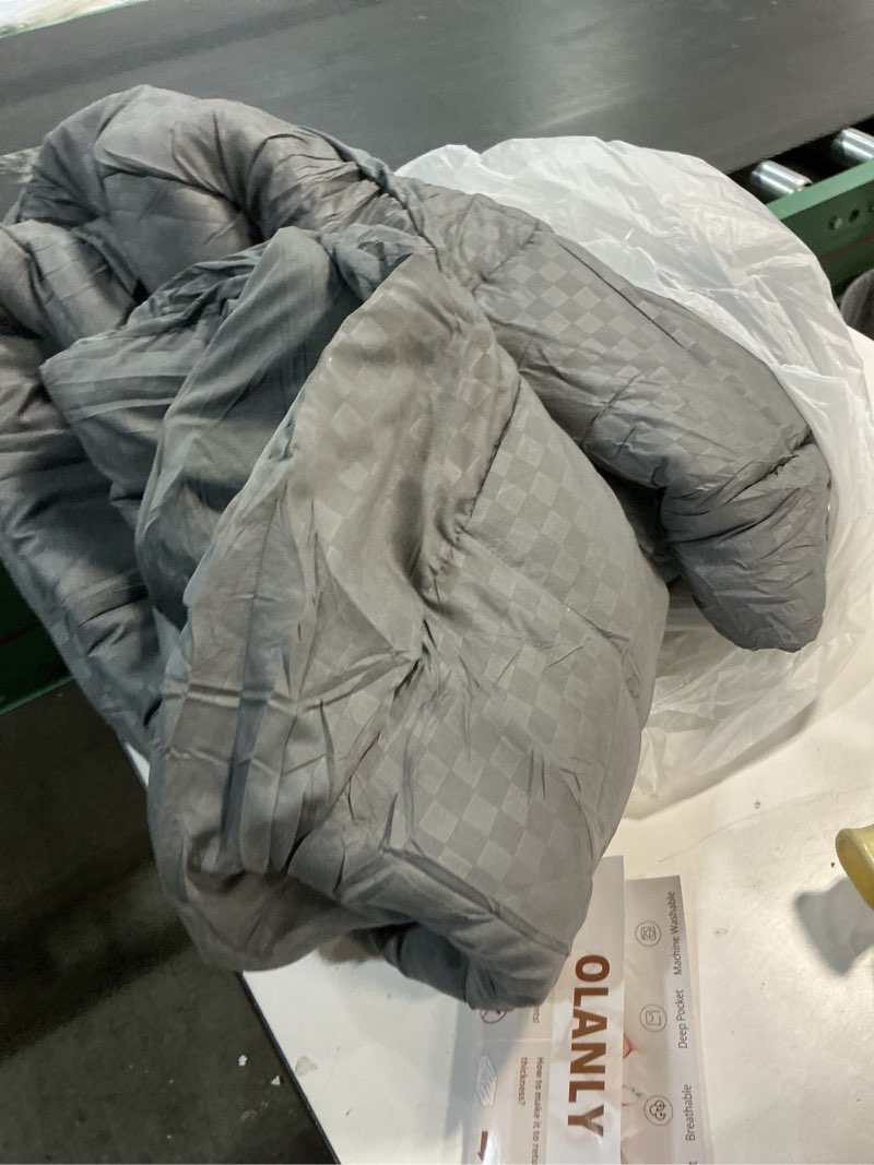 Condition photo showing As Is for OLANLY Full Mattress Topper – Viscose Made from Bamboo, Cooling Soft Full Pillow Top Mattress Pad for Back Pain Relief, Plush Down Alternative Fill Bed Topper with Elastic Deep Pocket, Light Gray Light Gray Full