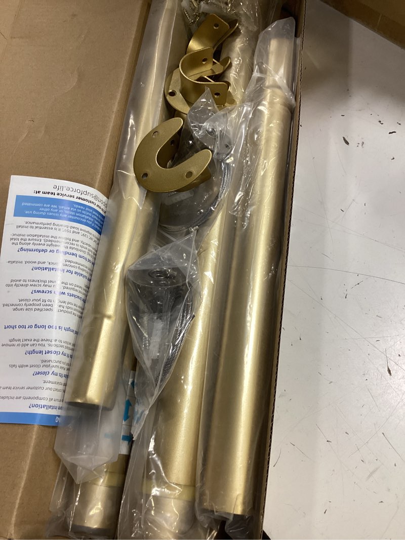 Condition photo showing Good Condition for supforce 2 pack closet rods for hanging clothes, 17 to 54 inches stepless adjustable metal closet rod, 1.3 inches heavy duty clothes hanging rod for closet wardrobes laundry rv, golden golden 17-54in 2pack