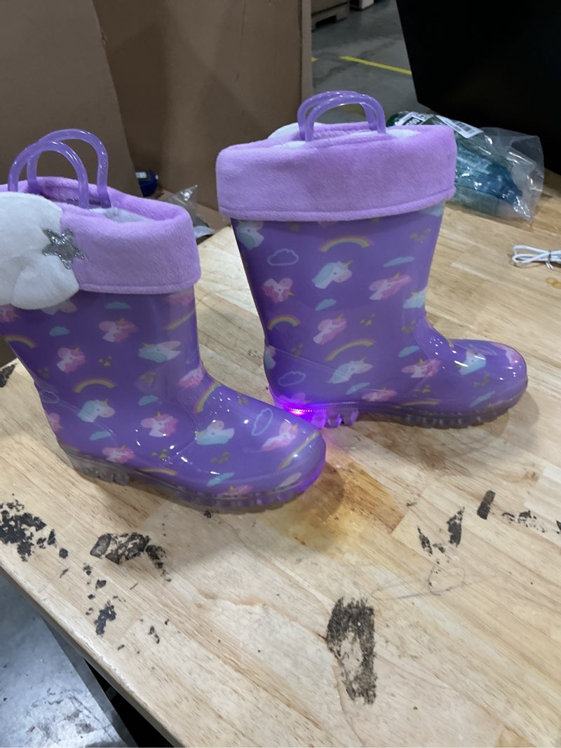 Condition photo showing As Is for light up warm kids rain boots, size 12