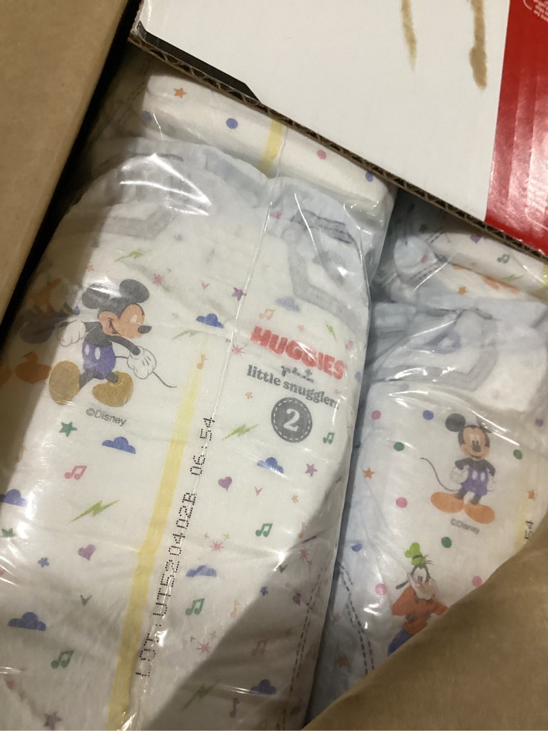 Condition photo showing New/Like New for huggies plus diapers size 2, 174 count
