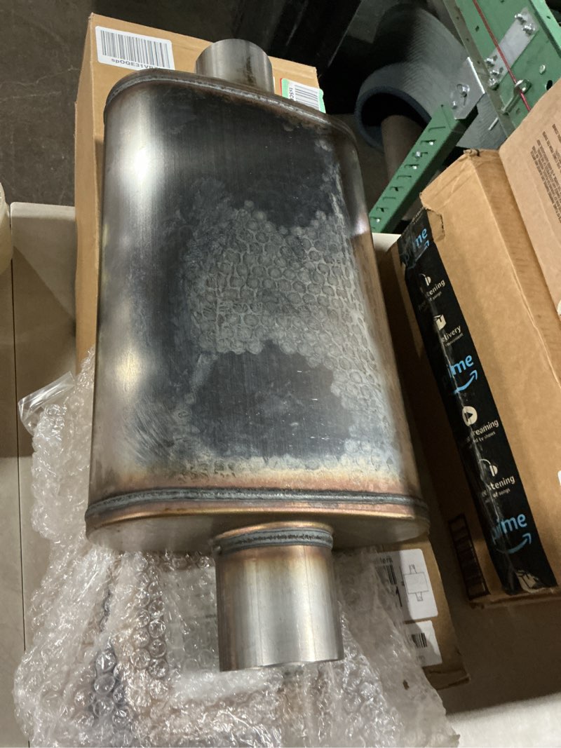 Condition photo showing As Is for stainless steel chamber muffler, 3 inch, offset/centered