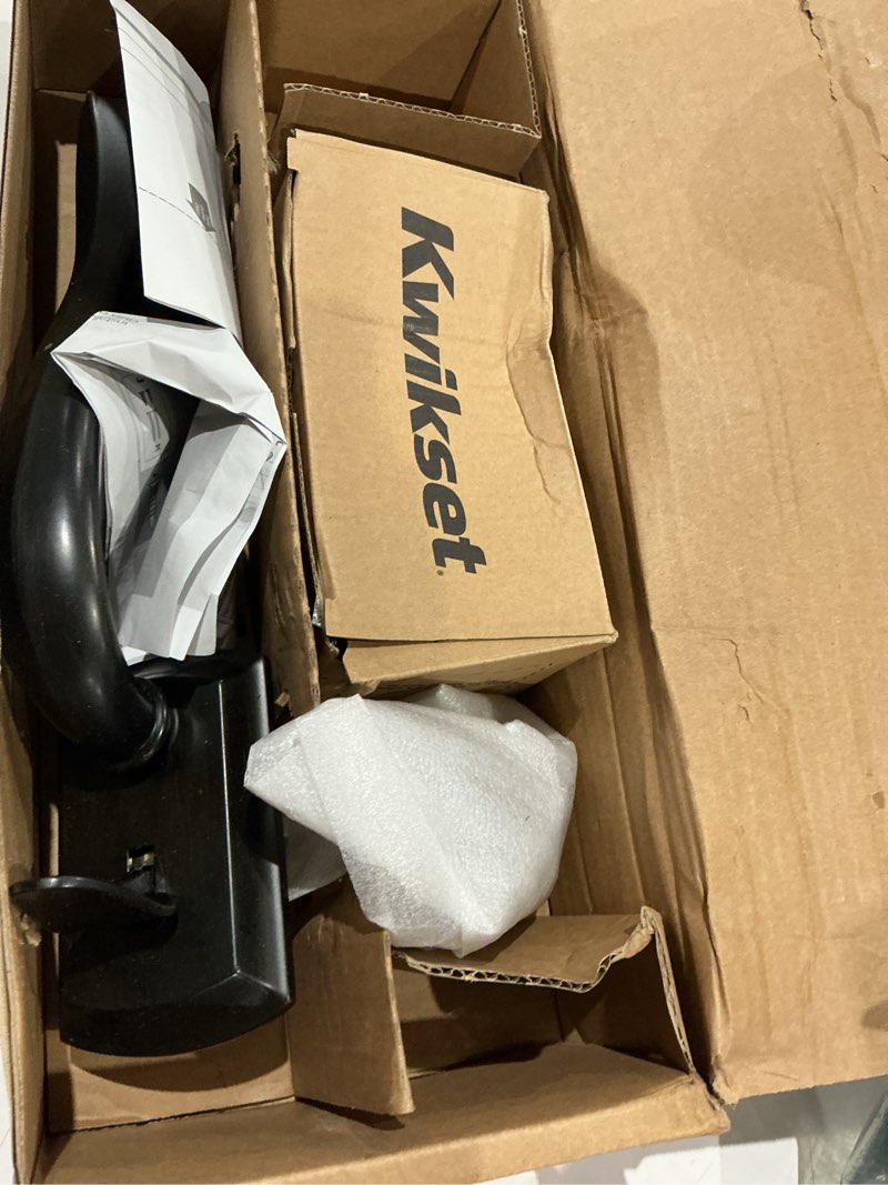 Condition photo showing As Is for kwikset avalon front door handle no lock, entry handleset exterior with interior reversible handed lever, non-locking, venetian bronze, deadbolt not included, with microban protection (pack of 1)