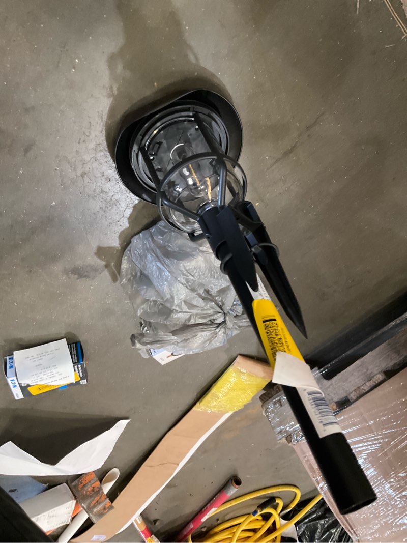 Condition photo showing As Is for harbor breeze path light 15 -lumens 0.2 -watt black solar led outdoor path light ( 3000-k )