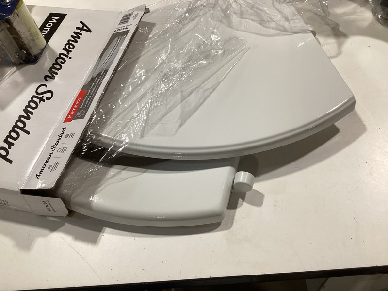 Condition photo showing Good Condition for american standard moments wood white elongated soft close toilet seat