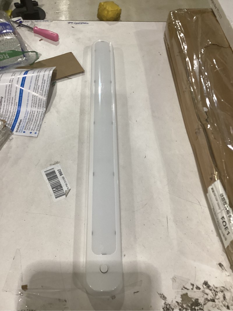 Condition photo showing As Is for ge under cabinet light, 24 inch, wireless, battery operated, 200 lumens, tap light, bright white led closet light, night light for kitchen, closet, and more, 58158-t1