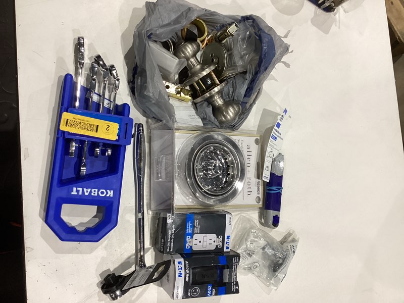 Condition photo showing As Is for assorted home improvement lot (small tools, screw, home accessories, etc.)