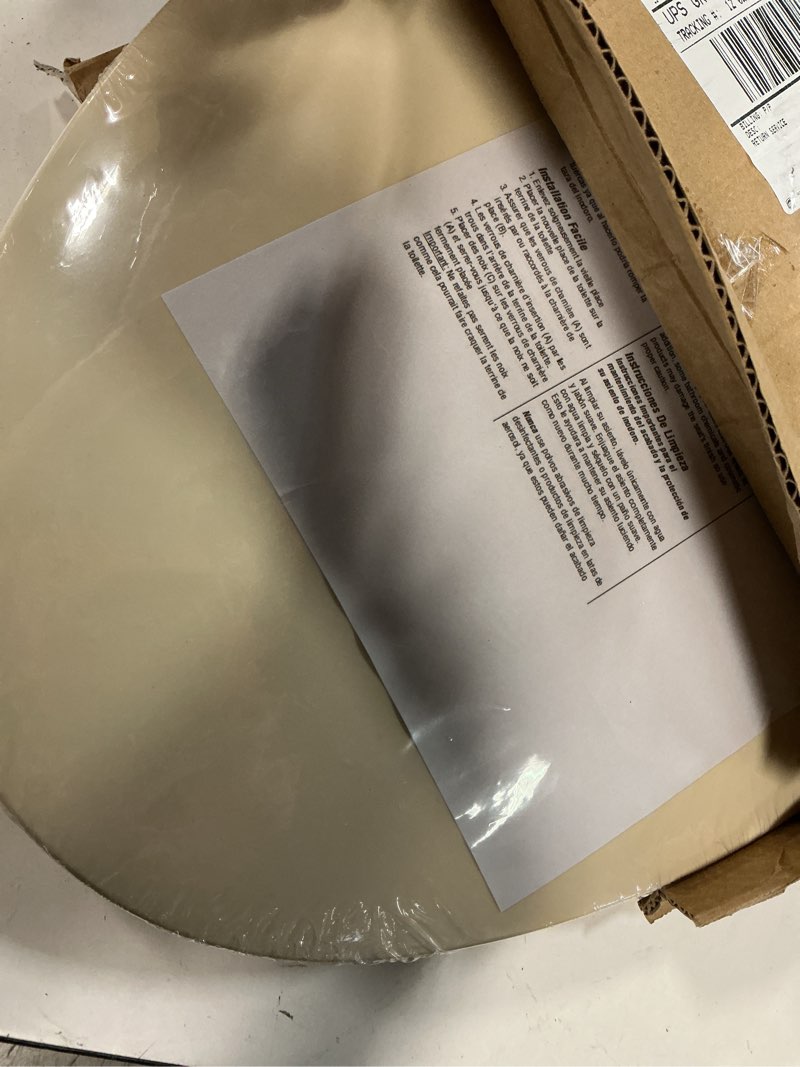 Condition photo showing New/Like New for highcraft premium elongated toilet seat with adjustable hinges - molded plastic toilet seat - fits standard elongated toilets - oval seat in bone/beige elongated bone