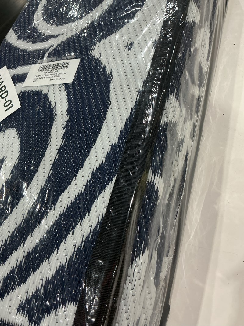 Condition photo showing Good Condition for olanly outdoor rug waterproof 5x8 ft clearance, reversible outdoor plastic straw rug with floral pattern, rv mat for patio, camping, balcony, deck, backyard, navy & white navy blue & white floral 5' x 8' (rectangular)