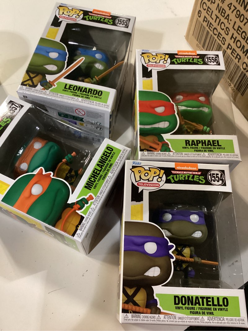 Condition photo showing New/Like New for teenage mutant ninja turtles: classic 4" turtles 4-pack figure bundle by playmates toys