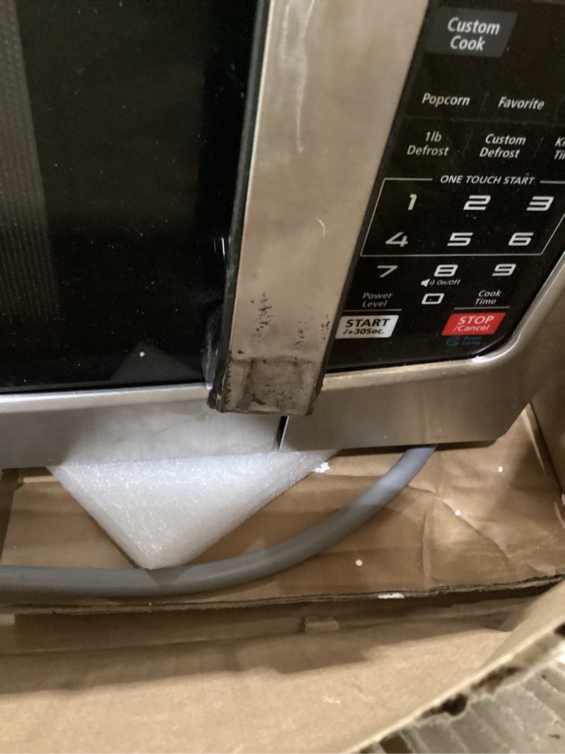 Condition photo showing As Is for toshiba em131a5c-ss countertop microwave ovens 1.2 cu ft with 12.4\" removable turntable smart humidity sensor, 12 auto menus mute function eco mode easy clean interior, 1000w, silver 1.20 cu.ft, not tested, incomplete