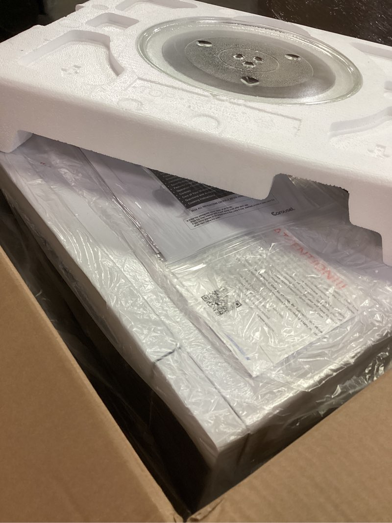 Condition photo showing New/Like New for SHARP Countertop Microwave Oven with Removable 12.4" Carousel Turntable, 1000 Watt, 1.1 Cubic Feet, White