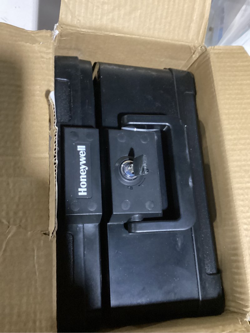 Condition photo showing As Is for honeywell safes & door locks - small safe box chest for home - fireproof safe holds #10 envelopes, usb flash - strong abs plastic - document, money safe with key lock system - 0.15 cu, black - 1101 4.0 litre safe box