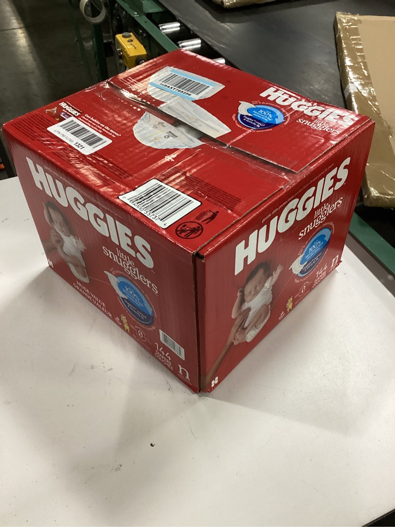 Condition photo showing New/Like New for Huggies Size Newborn Diapers, Little Snugglers Baby Diapers, Size Newborn (up to 10 lbs), 144 Count, Packaging May Vary